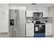 Updated kitchen, featuring stainless steel appliances at 7698 Cardiff Ct, St Petersburg, FL 33709