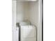 Small laundry closet with washer and dryer at 7698 Cardiff Ct, St Petersburg, FL 33709