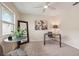 Home office featuring a writing desk and large window at 7698 Cardiff Ct, St Petersburg, FL 33709