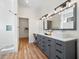 Modern bathroom featuring double vanity, step-in shower, and contemporary fixtures at 7701 40Th N Ter, St Petersburg, FL 33709