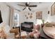 Charming Bedroom with crib, rocker, and changing table at 902 W Alsobrook St, Plant City, FL 33563