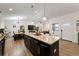 Island kitchen overlooking the dining and living areas at 902 W Alsobrook St, Plant City, FL 33563