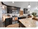 Modern kitchen with stainless steel appliances and granite counters at 902 W Alsobrook St, Plant City, FL 33563