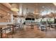 Community bar with wicker seating and wood floors at 9409 Barnacle Ln, Parrish, FL 34219