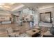 Elegant clubhouse lobby with comfortable seating and water feature at 9409 Barnacle Ln, Parrish, FL 34219
