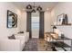 Bright home office featuring a desk, chairs, and neutral decor at 9409 Barnacle Ln, Parrish, FL 34219