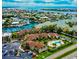 Aerial view of waterfront community, showcasing buildings and landscaping at 1028 Apollo Beach Blvd # 11, Apollo Beach, FL 33572