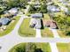 Aerial view of the house and surrounding neighborhood at 112 Sidney Ct, Rotonda West, FL 33947