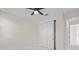 Well-lit bedroom with ceiling fan and double door closet at 112 Sidney Ct, Rotonda West, FL 33947