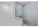 Modern shower with gray tile and a frameless glass enclosure at 112 Sidney Ct, Rotonda West, FL 33947