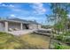 Large patio with seating and built-in grill at 11320 Gallinule Ave, Weeki Wachee, FL 34613