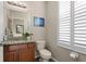 Bathroom with granite countertop and white toilet at 11522 Fountainhead Dr, Tampa, FL 33626
