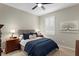 Bright bedroom with a ceiling fan and window shutters at 11522 Fountainhead Dr, Tampa, FL 33626