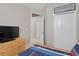Bedroom with built-in dresser and access to bathroom at 11522 Fountainhead Dr, Tampa, FL 33626