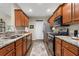 Modern kitchen with stainless steel appliances and granite countertops at 11522 Fountainhead Dr, Tampa, FL 33626