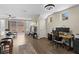 Open living area with wood floors, home office, and patio access at 11522 Fountainhead Dr, Tampa, FL 33626