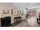 Open concept living space with hardwood floors and a sectional sofa at 11522 Fountainhead Dr, Tampa, FL 33626