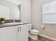 Simple bathroom with a single vanity and updated fixtures at 12722 Canter Call Rd, Lithia, FL 33547