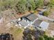 Aerial view of house, detached shed, and expansive backyard at 14450 Lancer Rd, Spring Hill, FL 34610