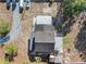 Overhead view of house showcasing roofline, and backyard at 14450 Lancer Rd, Spring Hill, FL 34610