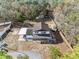 House with covered patio, large backyard, and detached shed at 14450 Lancer Rd, Spring Hill, FL 34610