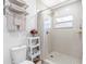 Spa-like bathroom with walk-in shower and pebble floor at 14450 Lancer Rd, Spring Hill, FL 34610