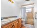 Bathroom with shower/tub and wood vanity at 14450 Lancer Rd, Spring Hill, FL 34610