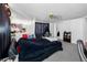 Bedroom with a large bed and TV at 14450 Lancer Rd, Spring Hill, FL 34610
