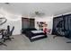 Bedroom with a large bed and TV at 14450 Lancer Rd, Spring Hill, FL 34610