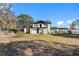 House with pool and detached shed in backyard at 14450 Lancer Rd, Spring Hill, FL 34610