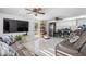 Spacious Gathering room with comfortable seating and large TV at 14450 Lancer Rd, Spring Hill, FL 34610