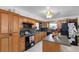 Kitchen with wood cabinets and island at 14450 Lancer Rd, Spring Hill, FL 34610