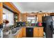 Kitchen with wood cabinets and island at 14450 Lancer Rd, Spring Hill, FL 34610