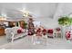 Spacious living room features ornate furniture and a Christmas tree at 14450 Lancer Rd, Spring Hill, FL 34610