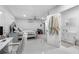 Bright main bedroom with large bed and ensuite bathroom at 14450 Lancer Rd, Spring Hill, FL 34610