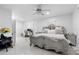 Spacious main bedroom with a large bed and sitting area at 14450 Lancer Rd, Spring Hill, FL 34610