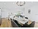 Modern dining room with marble table and gray chairs at 14469 Bulger Ave, Port Charlotte, FL 33953