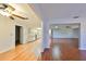Open dining area with hardwood floors and kitchen access at 1526 Leland Dr # 1525, Sun City Center, FL 33573