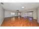 Large living room with wood flooring and access to backyard patio at 1526 Leland Dr # 1525, Sun City Center, FL 33573
