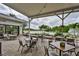 Outdoor patio seating overlooking a pond at 1526 Leland Dr # 1525, Sun City Center, FL 33573