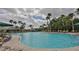 Large resort-style pool with plenty of lounge chairs at 1526 Leland Dr # 1525, Sun City Center, FL 33573