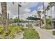 Relaxing resort-style pool with shaded seating at 1526 Leland Dr # 1525, Sun City Center, FL 33573