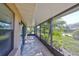 Bright screened porch overlooks a tranquil backyard at 1526 Leland Dr # 1525, Sun City Center, FL 33573