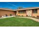 Single story home with stone accents, landscaped yard, and a two car garage at 153 Sunward Ave, Palm Harbor, FL 34684