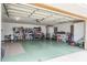 Attached garage with ample storage shelving at 153 Sunward Ave, Palm Harbor, FL 34684