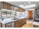 Kitchen features stainless steel appliances and a large island at 153 Sunward Ave, Palm Harbor, FL 34684