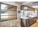 Updated kitchen with wood cabinets and modern sink at 153 Sunward Ave, Palm Harbor, FL 34684