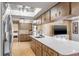 Modern kitchen with stainless steel appliances and white countertop at 153 Sunward Ave, Palm Harbor, FL 34684