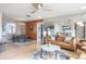 Open concept living and dining area with hardwood floors and stylish furnishings at 153 Sunward Ave, Palm Harbor, FL 34684