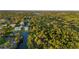 Aerial view of canal-front home with private dock and lush surroundings at 159 Danforth Dr, Punta Gorda, FL 33980